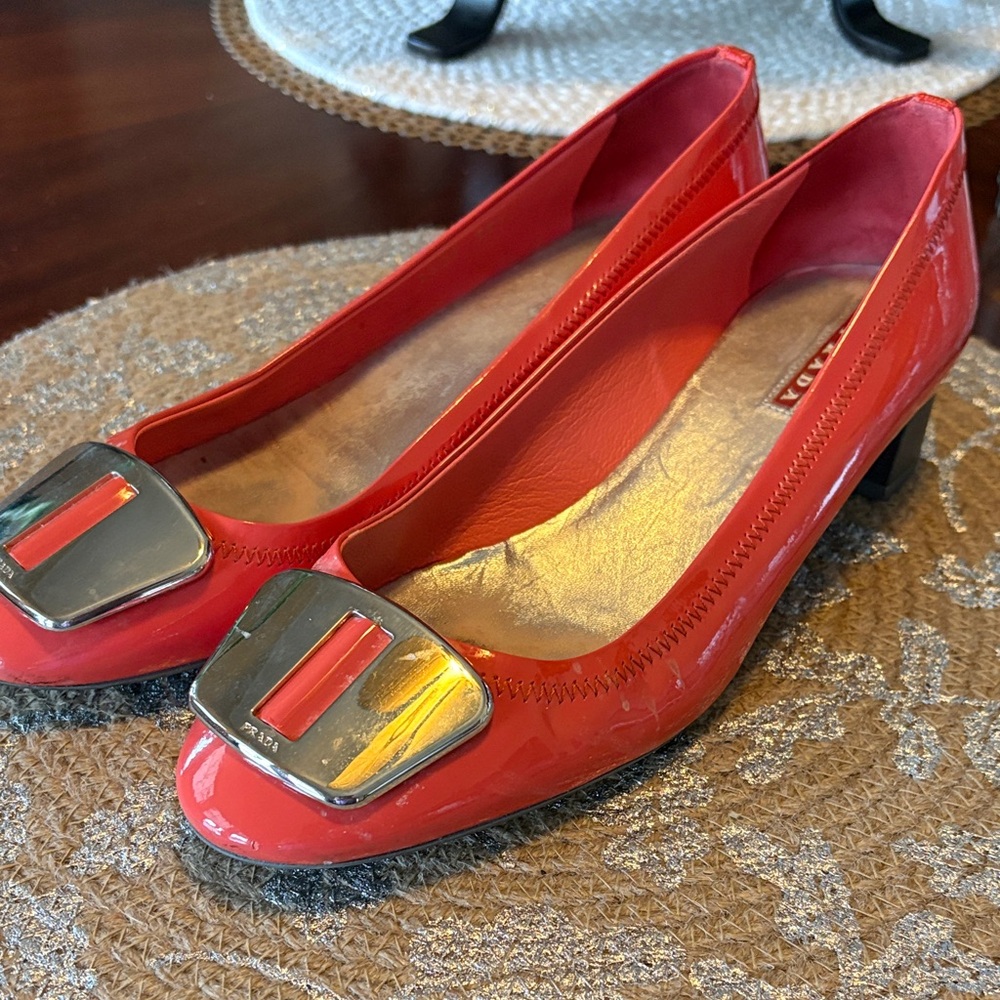 Prada Salmon colored Patent Leather Low Heel Loafers with Silver Buckle